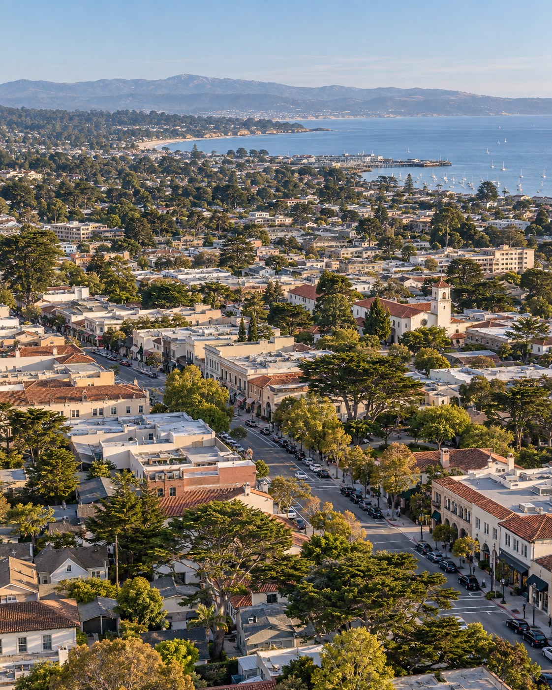 Illustrative aerial view of Monterey Peninsula neighborhoods and downtown